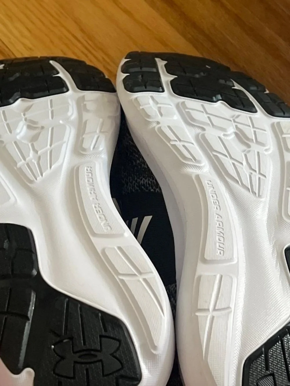 Under Armour Men’s Black and White Slip-On Athletic Shoes with Branded Strap